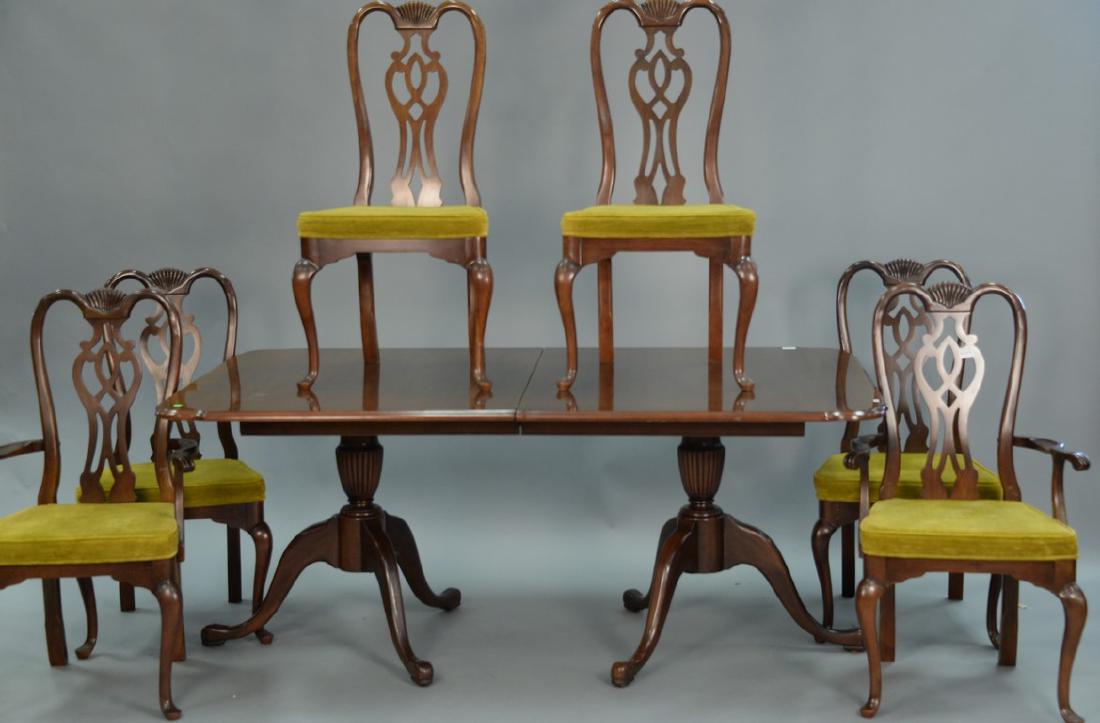 Thomasville mahogany double pedestal dining table with: Thomasville mahogany double pedestal dining table with two 20inch leaves and six Queen Anne style chairs. ht. 30in., wd. 45in., lg. 72in., opens to 112in.