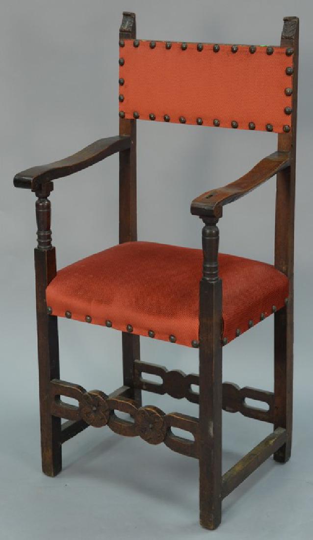 Italian style armchair with carved rosette stretcher.: Italian style armchair with carved rosette stretcher.
