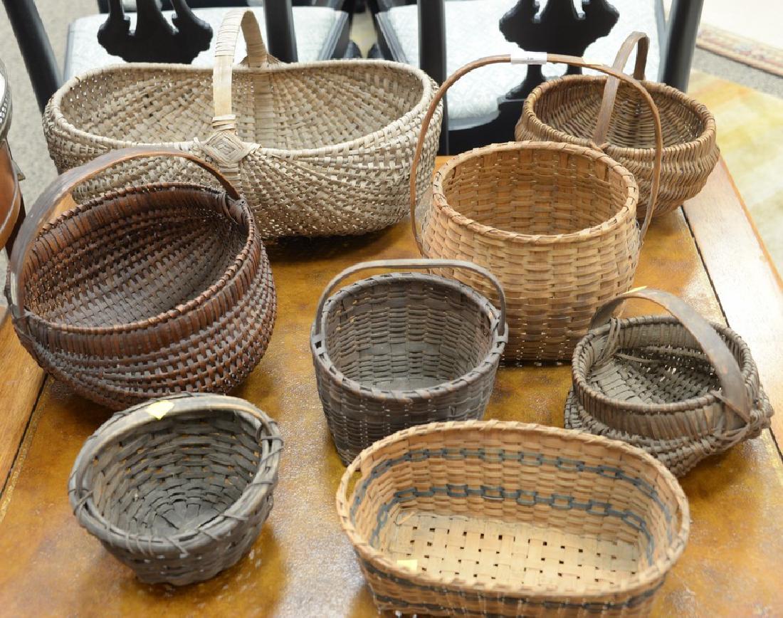 Eight piece basket lot. largest: ht. 13in., lg. 20in. (1 of 4)