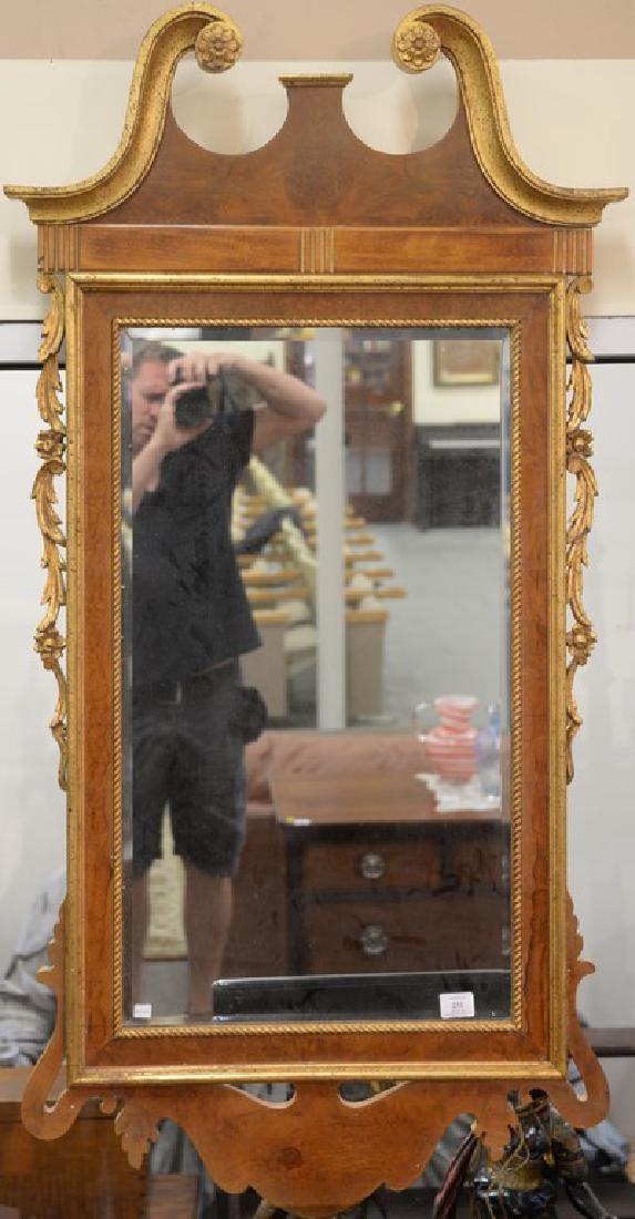 Chippendale style mirror. 54" x 28" Provenance: Estate: Chippendale style mirror. 54" x 28" Provenance: Estate of Arthur C. Pinto, MD