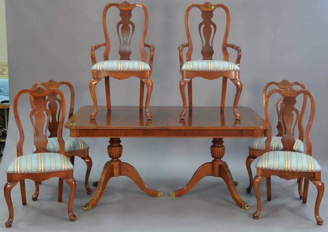 Seven piece lot Lexington mahogany double pedestal: Seven piece lot Lexington mahogany double pedestal dining table with banded inlaid top and two 15inch leaves and six Queen Anne style chairs. ht. 30in., top: 45" x 66", opens to 45" x 96"