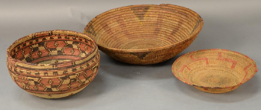 Three coiled Indian baskets, each with decoration.: Three coiled Indian baskets, each with decoration. largest: dia. 15 3/4in. Provenance: Estate of Arthur C. Pinto, MD