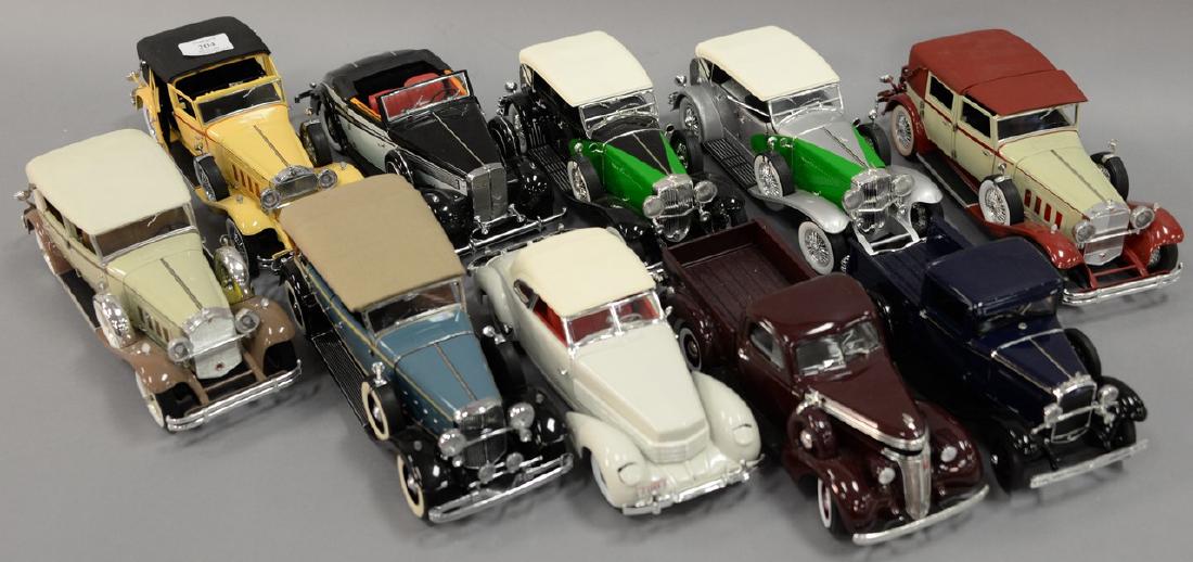 Group of ten 1930's model cars including 1930 red and (1 of 9)