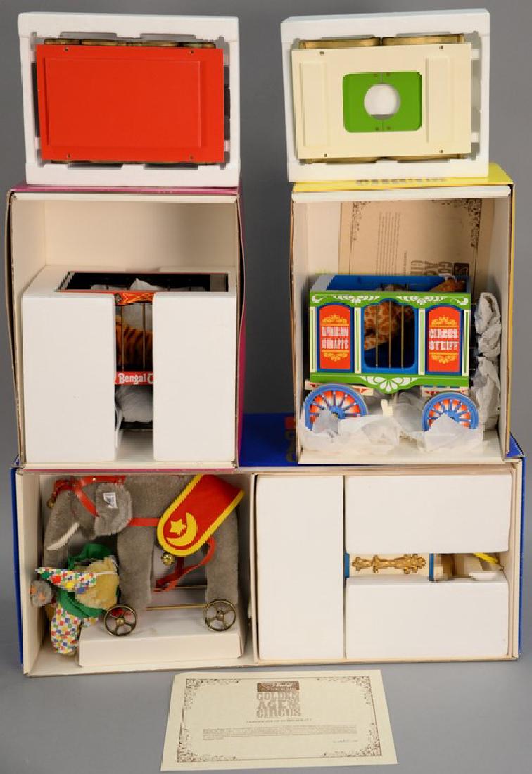 Three Steiff Golden Age of the Circus complete set in: Three Steiff Golden Age of the Circus complete set in original boxes with elephant and bear along with three circus carts.