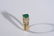 18 karat gold ring set with center oval emerald flanked - 2