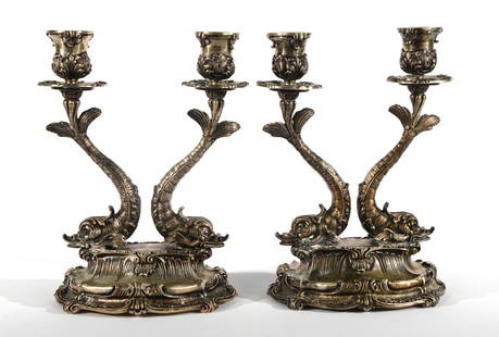 Pair of Mario Buccellati Italian silver two-light: Pair of Mario Buccellati Italian silver two-light candelabra having oval base and two dolphin form supports, each marked under base: Buccellati, Italy, sterling, 925, *26MI. ht. 7 1/2in., 44.5 troy