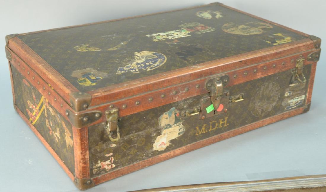 Louis Vuitton suitcase having two labels inside bought (1 of 7)