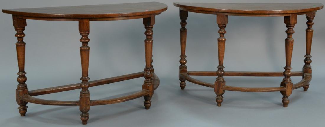 Pair of Continental walnut demilune tables on turned (1 of 5)