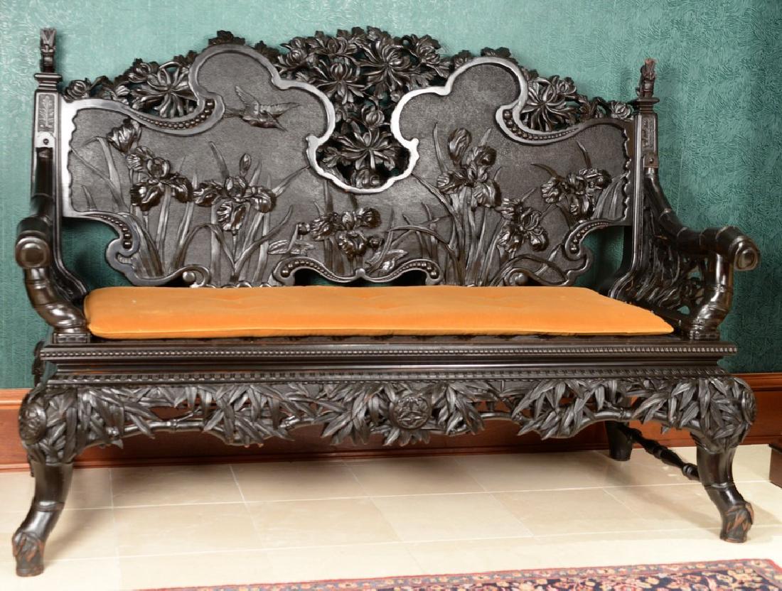 Chinese hardwood settee with pierce carved back and (1 of 7)