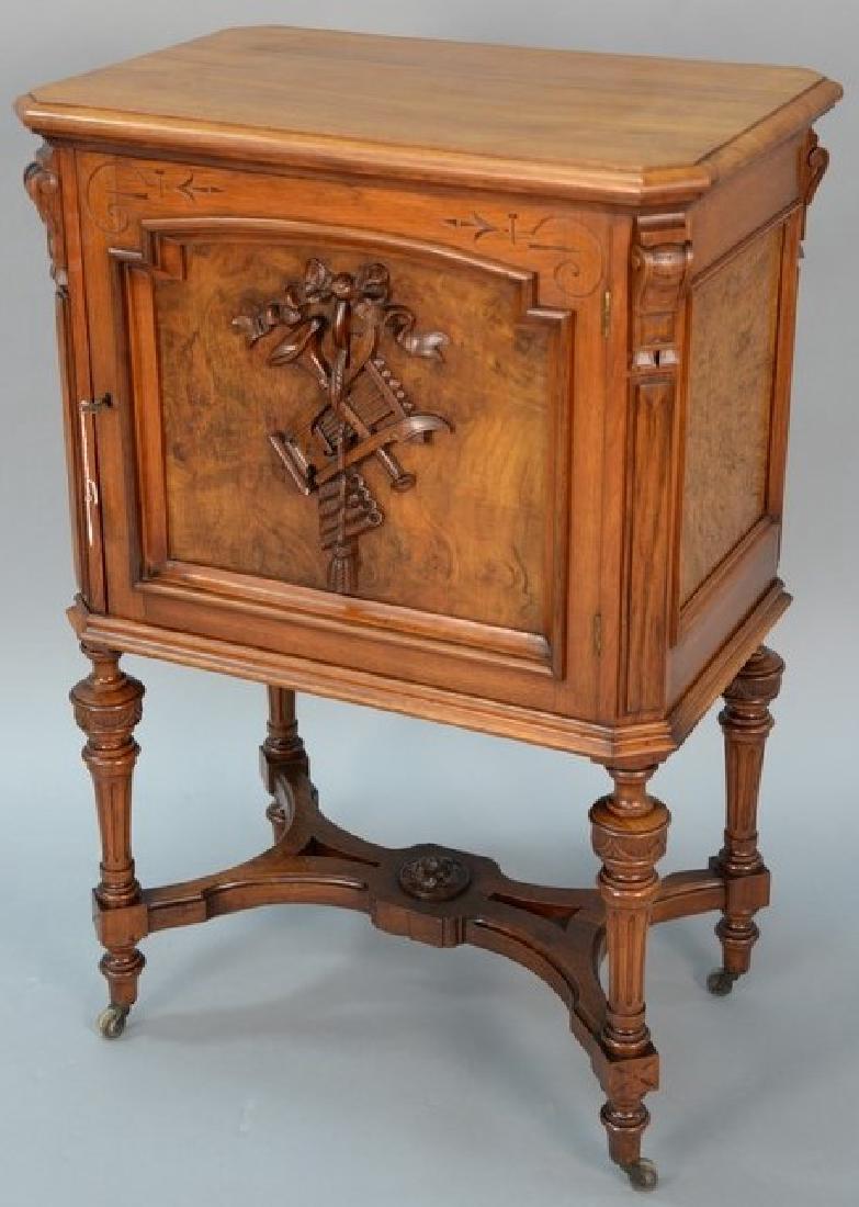 Renaissance Revival walnut music cabinet having carved (1 of 6)