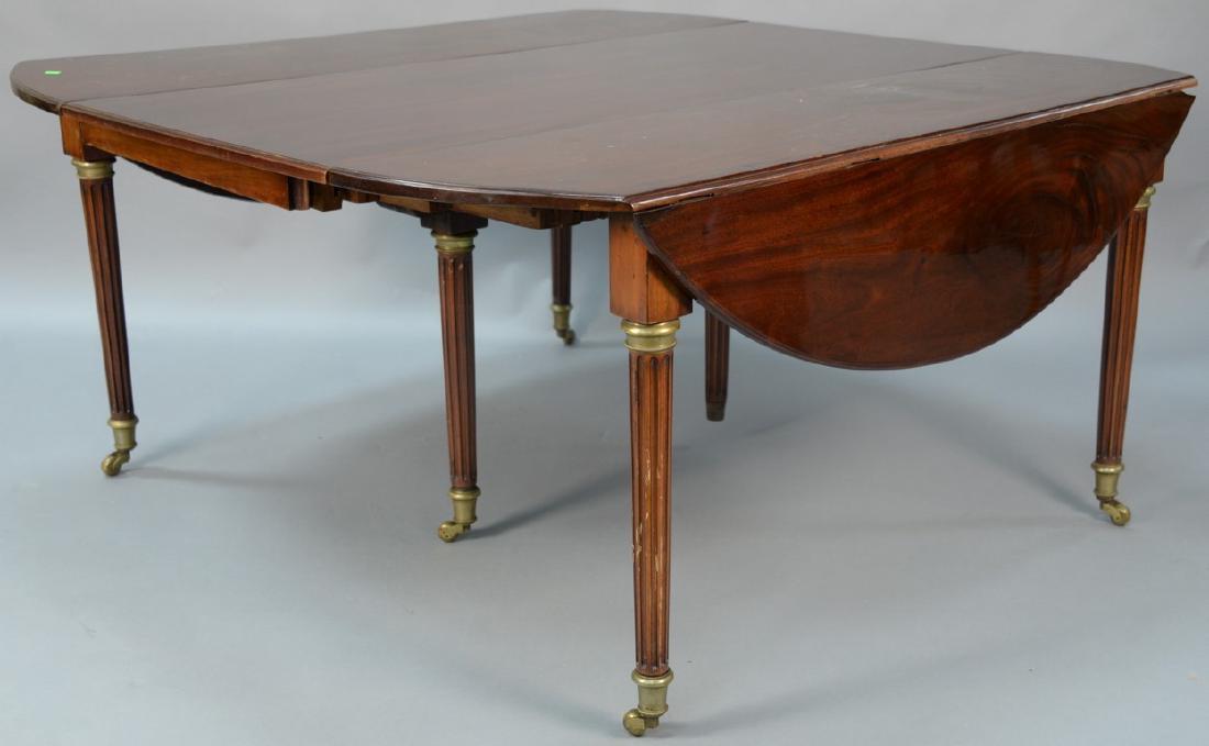 Continental mahogany drop leaf table having oval drop (1 of 6)