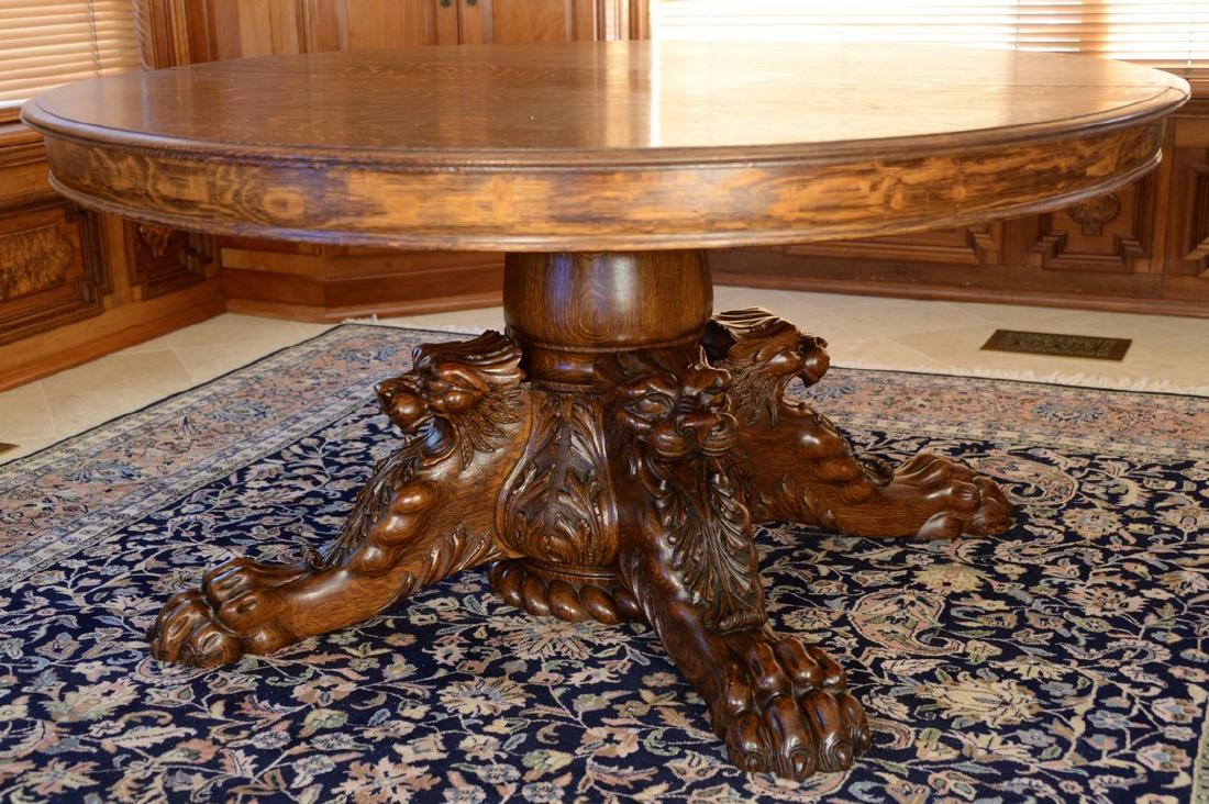 Victorian round oak table having center pedestal carved (1 of 7)