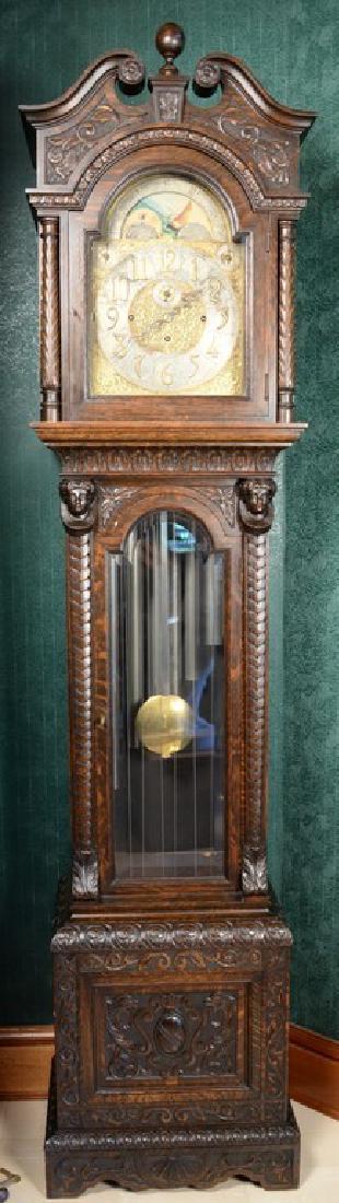 Carved oak tall case clock having Elliot type brass (1 of 6)