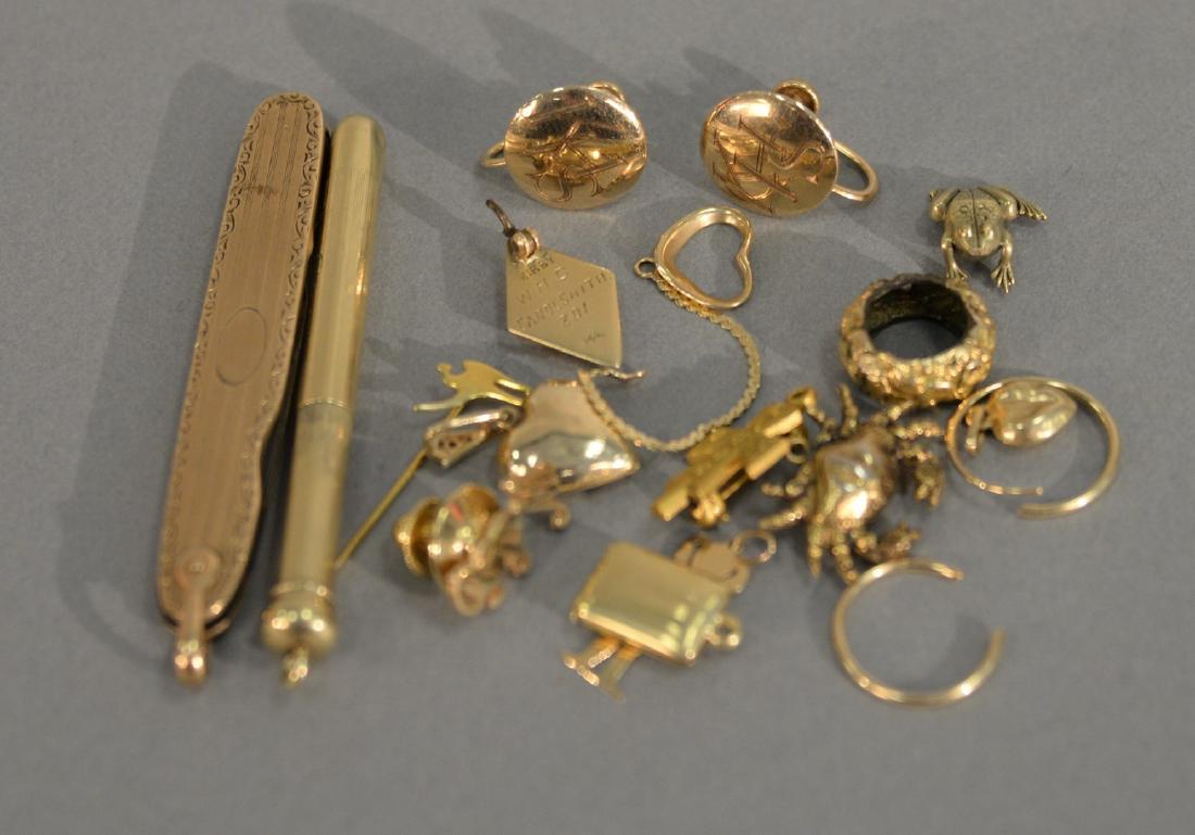Gold lot to include kife, pencil, charms, buttons, etc. (1 of 8)