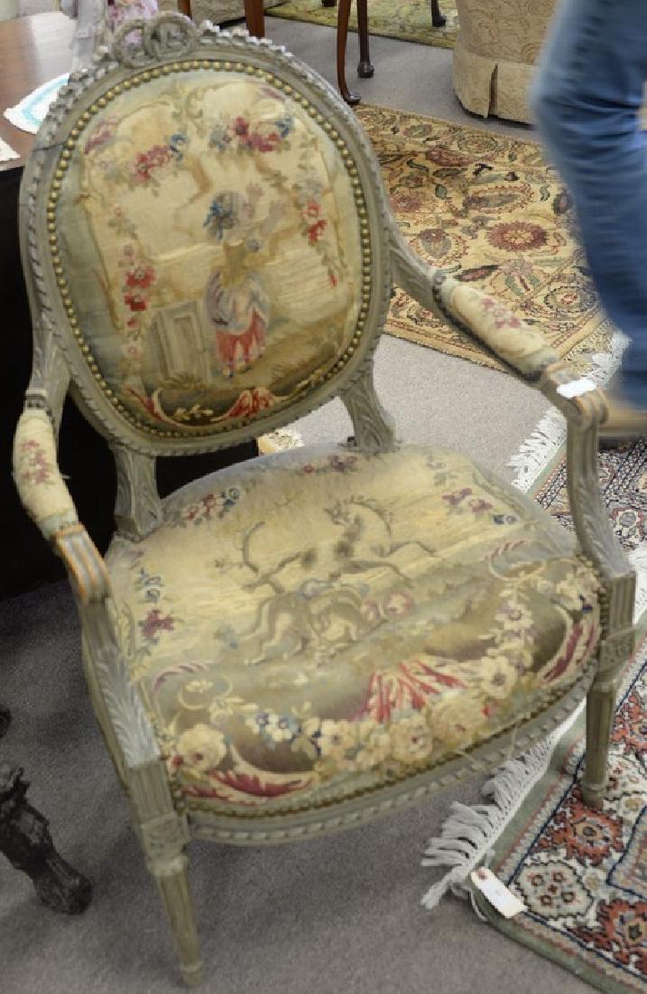 Louis XVI style fauteuil with Aubusson upholstered seat: Louis XVI style fauteuil with Aubusson upholstered seat and back, late 19th century, (worn, frame repaired).