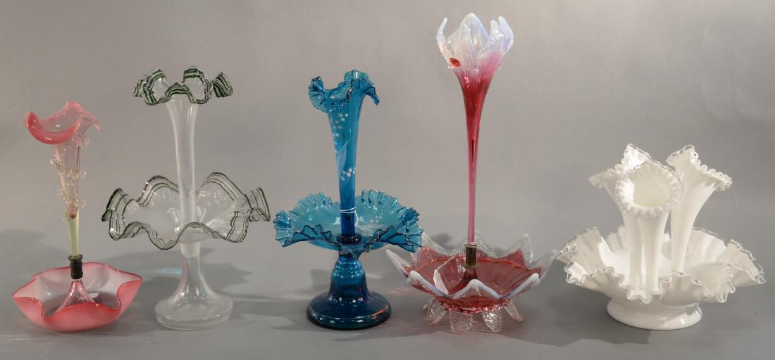 Five epergnes including a cranberry, pink, blue, clear,: Five epergnes including a cranberry, pink, blue, clear, and white. heights: 10 1/2in. to 18 1/2in. Provenance: Property from the Estate of Frank Perrotti Jr. of Hamden, Connecticut