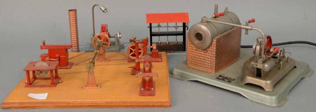 Two Electric Steam engine and board mounted with: Two Electric Steam engine and board mounted with miniature belt driven tools, table saw, drill press, by Jensen Manufacturing.