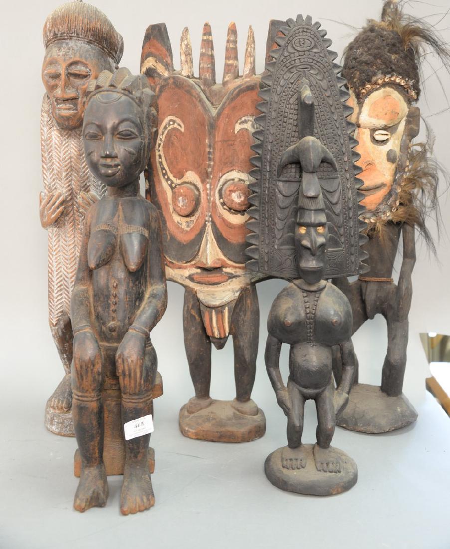 Group of five tribal African figural wood sculptures. (1 of 9)