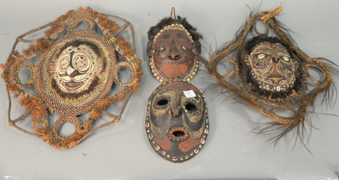 Group of four turtle shell African masks. ht. 10in. to (1 of 6)