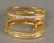14K yellow gold and diamond channel set "huggie"