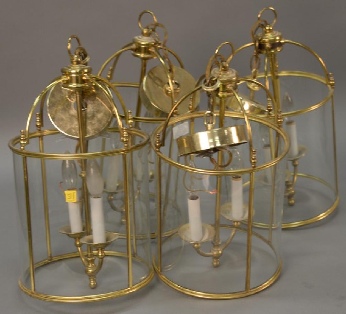 Set of four brass and glass two light hanging lights. (1 of 3)
