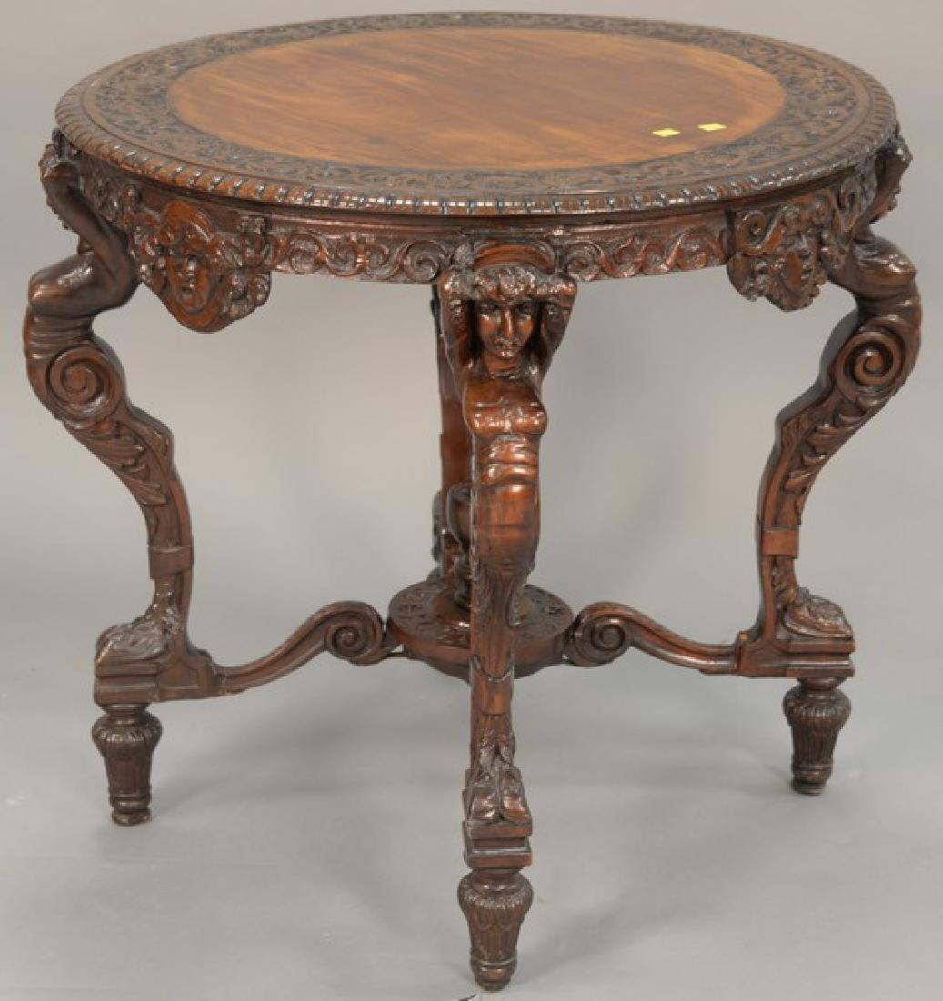 Mahogany round occasional table with carved top and (1 of 4)