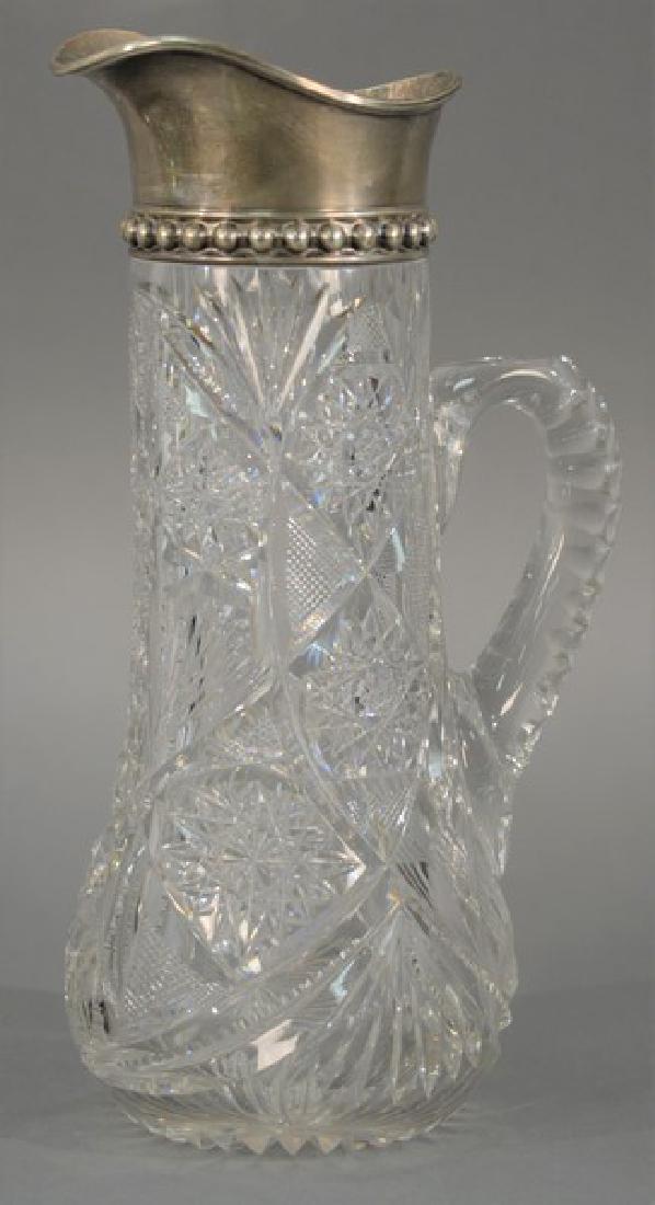 Libbey cut glass pitcher with sterling silver top. (1 of 3)