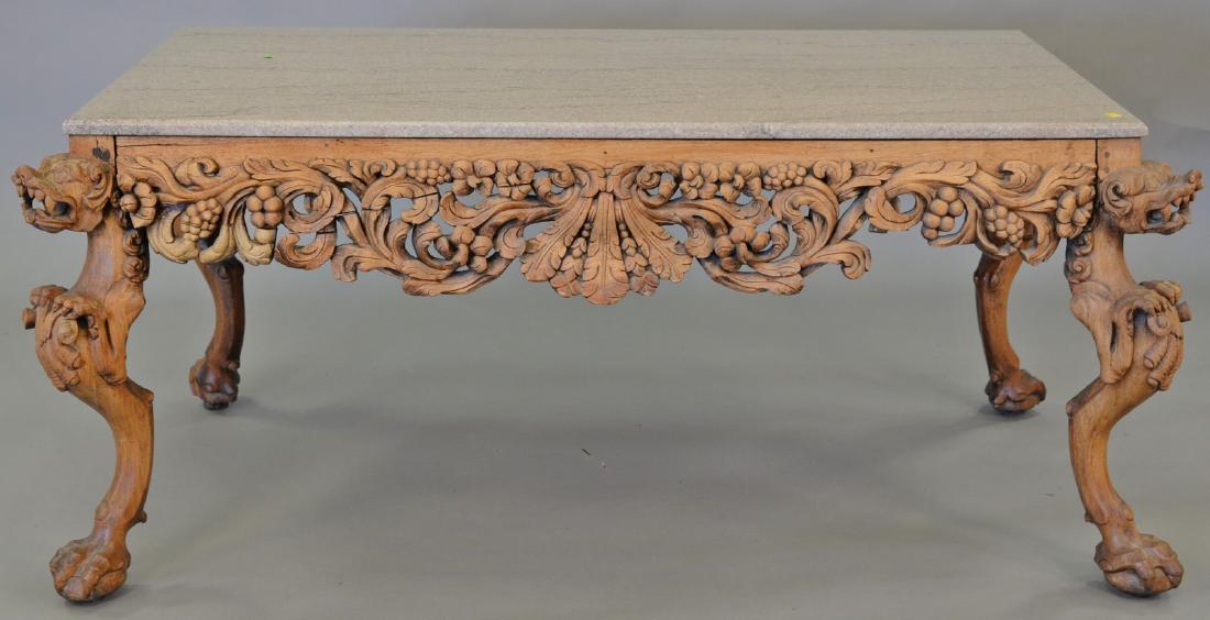 Hardwood Chinese table having granite top over carved (1 of 5)
