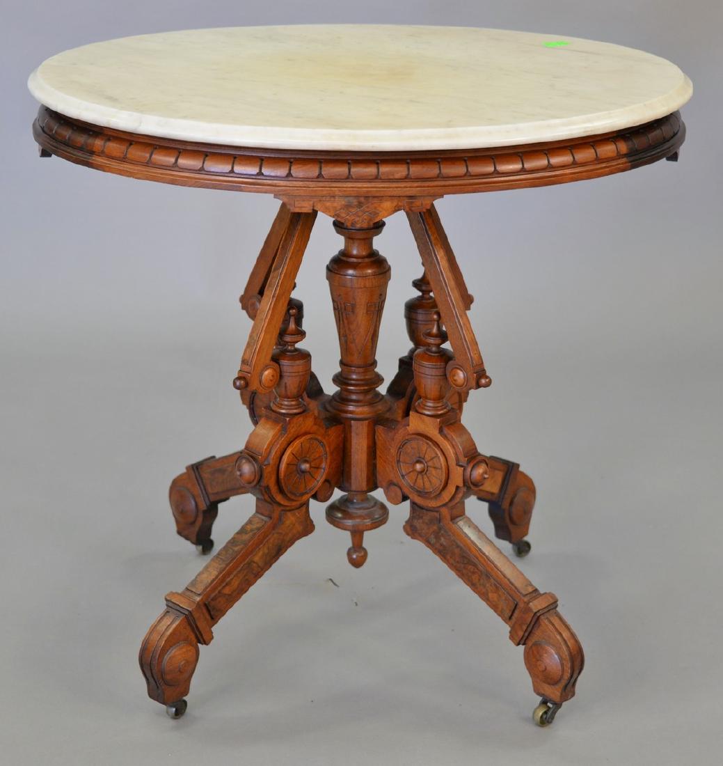 Victorian walnut oval marble top table. top: 24" x 31" (1 of 4)