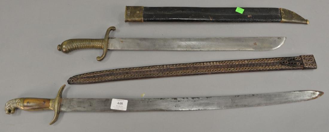 Two swords with sheathes. lg. 24 in. & 31 in. (1 of 3)