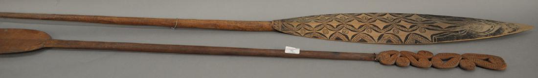 Two African paddles, one with painted end and the other (1 of 4)