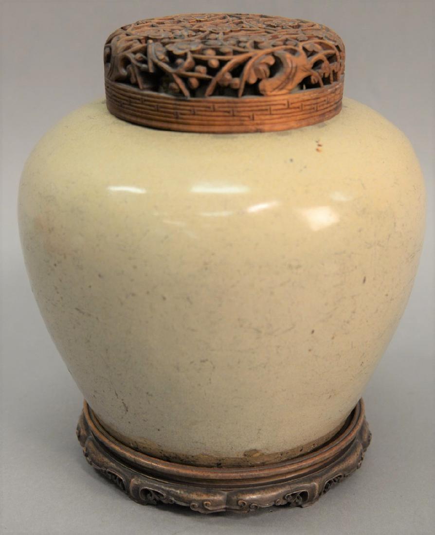 Chinese glazed ovoid jar with pierced carved hardwood (1 of 4)
