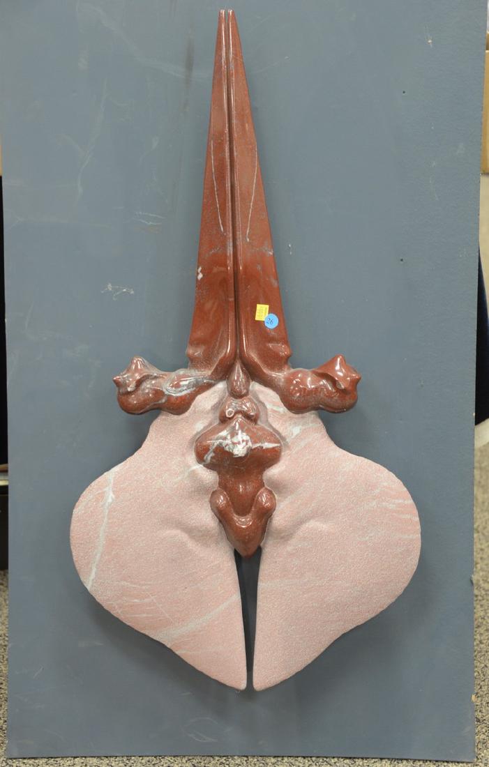 Carved stone sculpture mounted on grey wood backing (1 of 3)