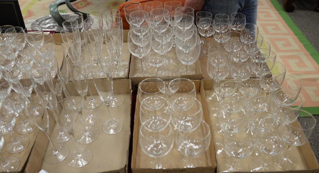 Six box lots of crystal and glass champagne flutes,: Six box lots of crystal and glass champagne flutes, wine glasses, etc. Provenance: Estate of Peggy & David Rockefeller having stamp/label.