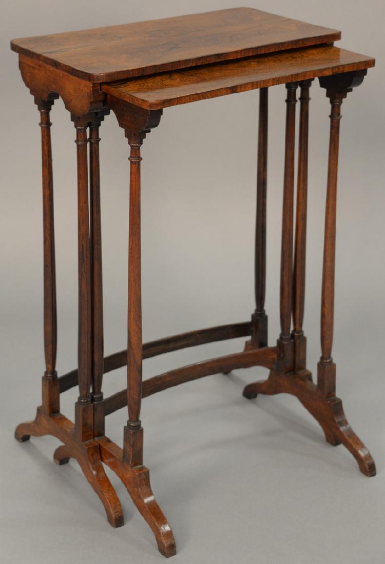 Nest of two rosewood stacking tables. height 29 inches, (1 of 4)