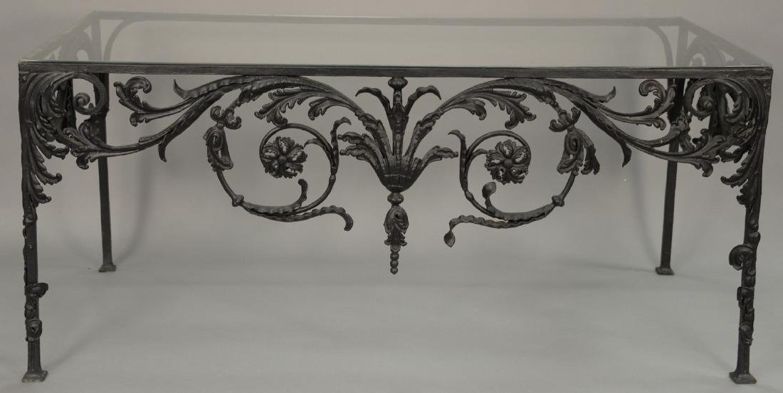 Iron glass top table with scroll work decoration on (1 of 5)