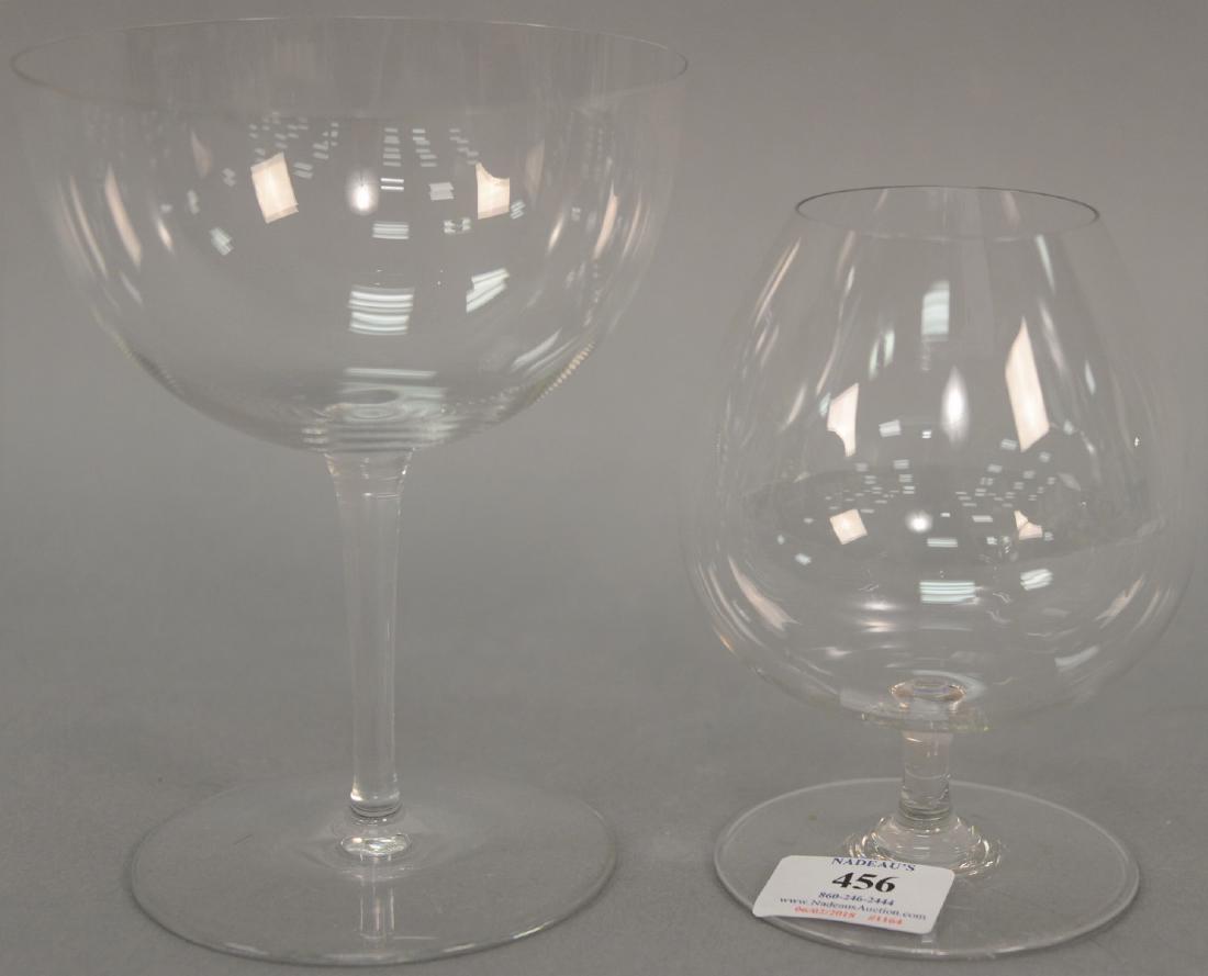 Eighteen piece Baccarat set to include seven oversized: Eighteen piece Baccarat set to include seven oversized gourmet/wine glasses and eight large brandy glasses. wine: height 6 7/8 inches, brandy: height 5 3/4 inches Provenance: Estate of Peggy & David