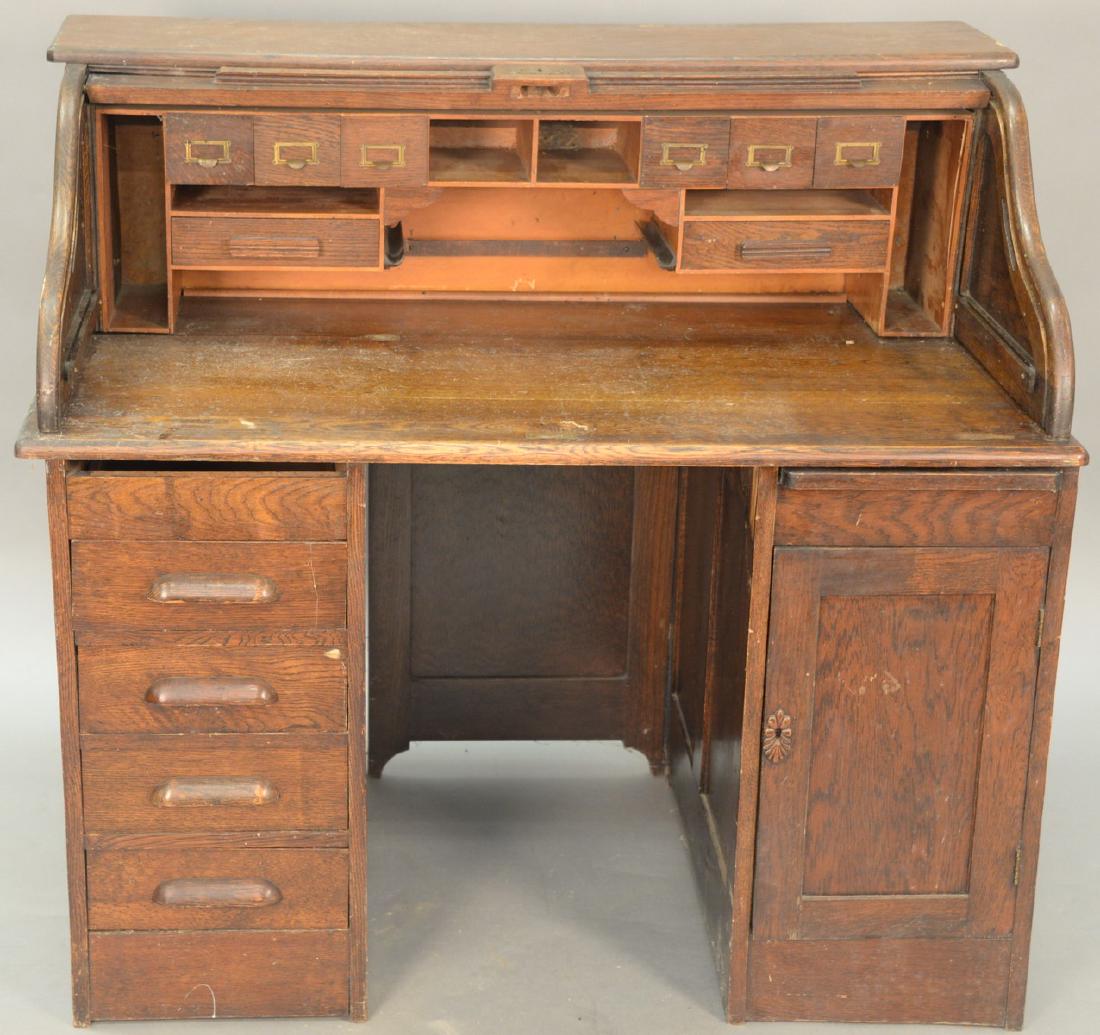 Oak S roll top desk. height 44 1/2 inches, width 48: Oak S roll top desk. height 44 1/2 inches, width 48 inches Provenance: Estate of Peggy & David Rockefeller having stamp/label.