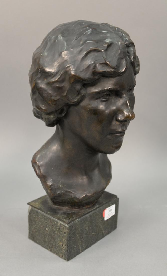 Bronze bust of a woman on granite base, marked C.H.W. (1 of 3)