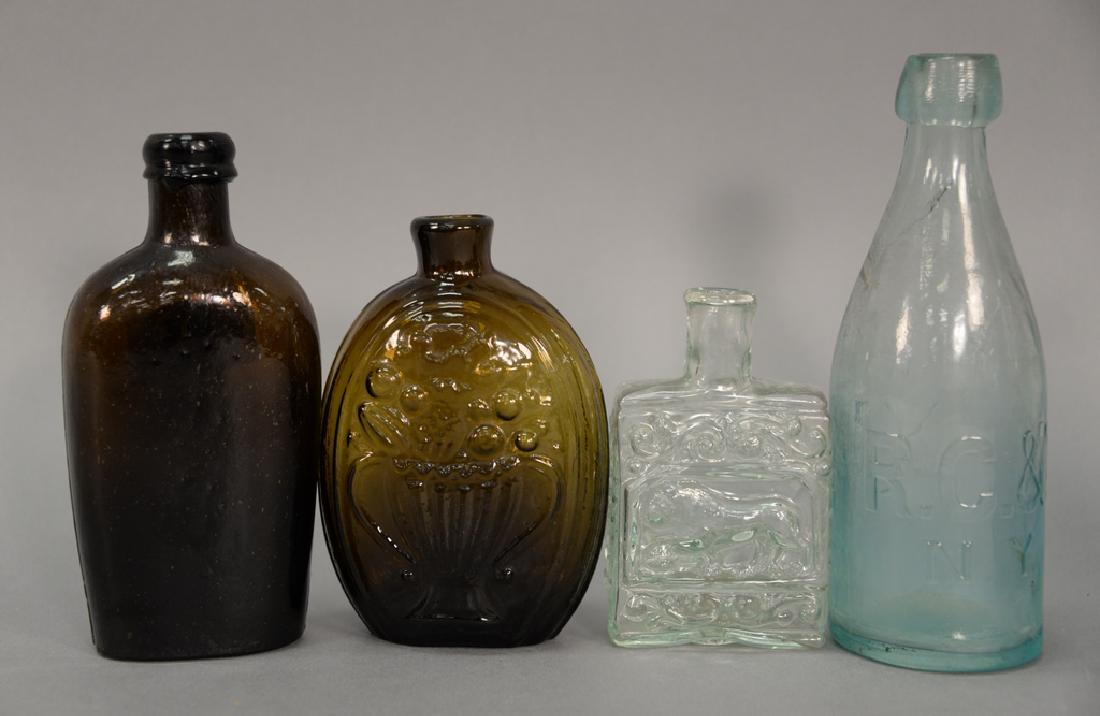 Group of four bottles (1 of 3)