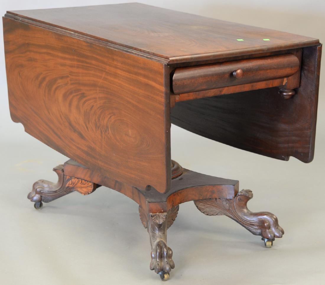 Federal mahogany paw foot drop leaf table, circa 1840. (1 of 4)