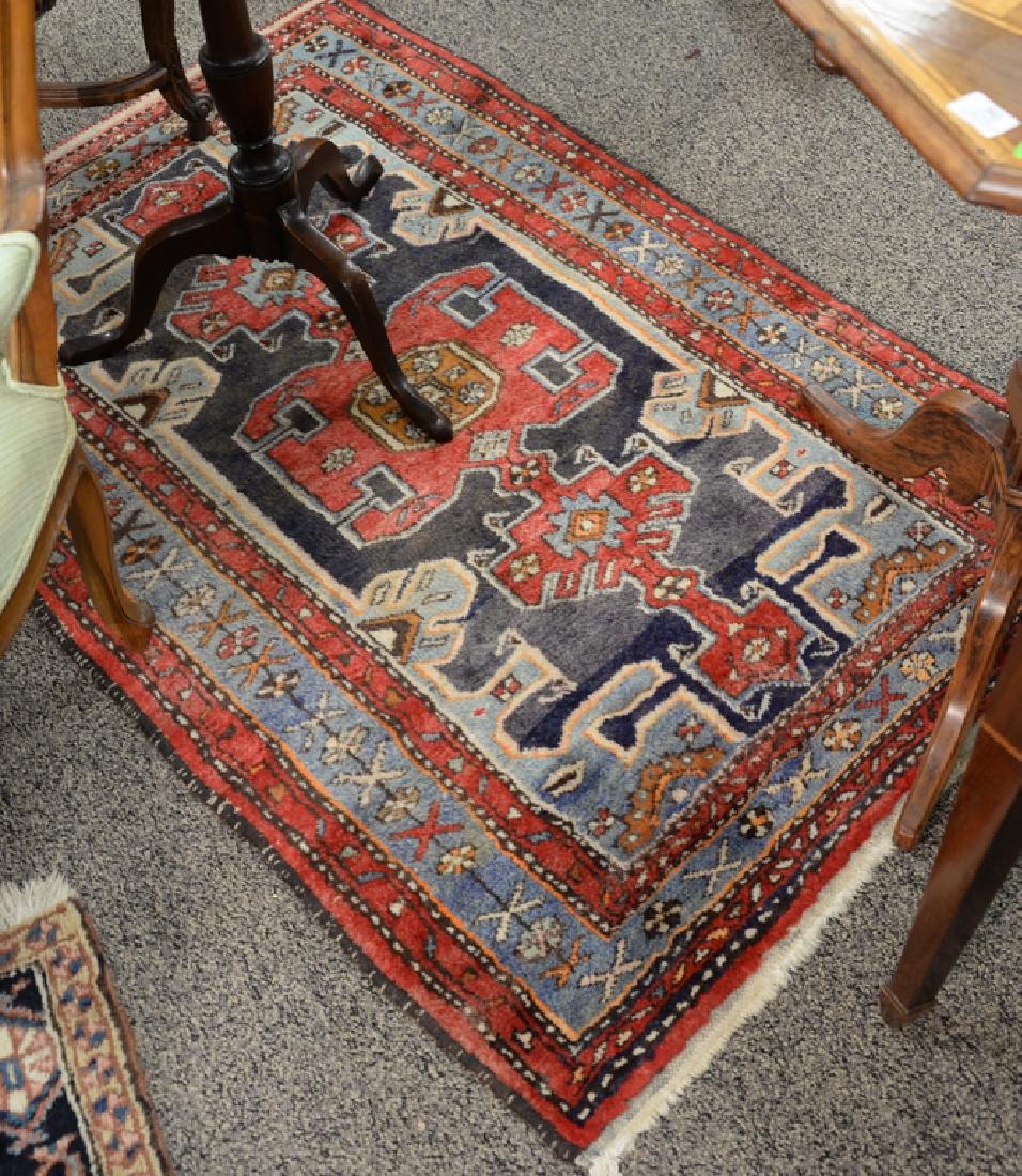 Two Oriental throw rugs. 3' x 5' and 3' x 5'3" (1 of 2)
