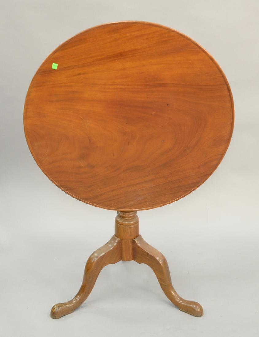 Mahogany tip table. ht. 29 in., dia. 31 in. (1 of 4)