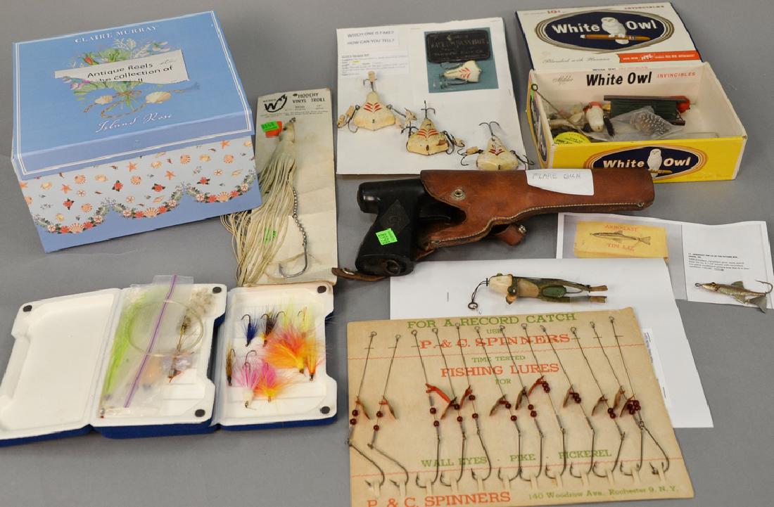 Group lot with flare gun, lures, flies, and decoy: Group lot with flare gun, lures, flies, and decoy weights.