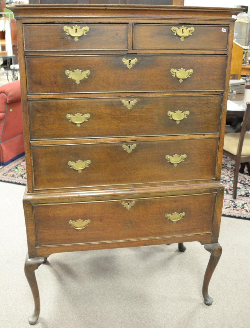 Two over four drawer Queen Anne style oak highboy. ht.: Two over four drawer Queen Anne style oak highboy. ht. 62 1/2 in., wd. 39 in.