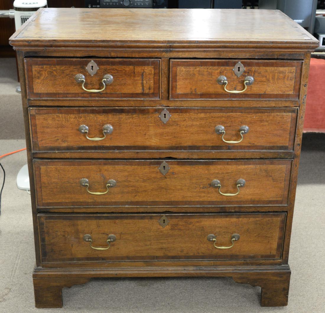 Two over three drawer oak chest on bracket feet. ht. 42 (1 of 4)