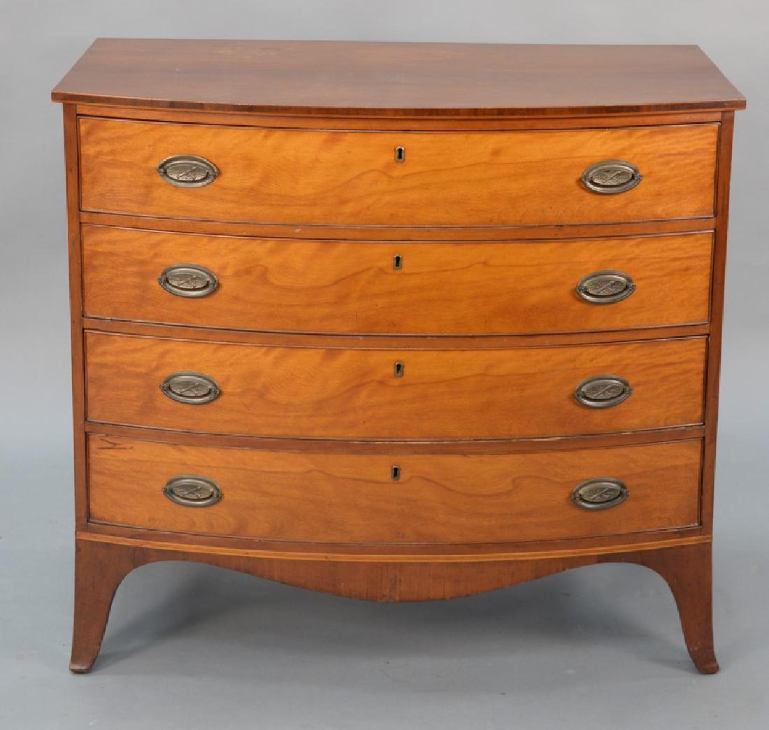 Federal bowed front four drawer chest, circa 1800.