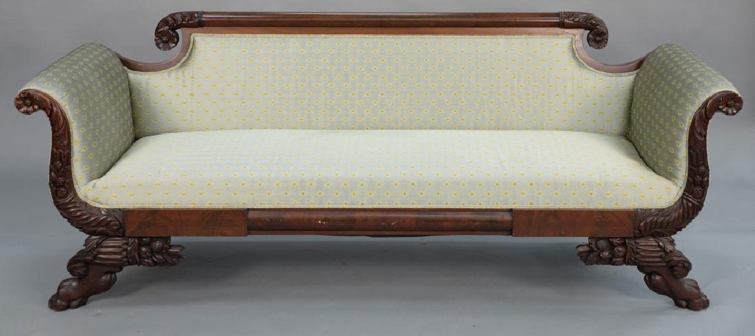 Federal mahogany sofa with cornucopia carving and paw: Federal mahogany sofa with cornucopia carving and paw feet. height 31 in., length 82 in.