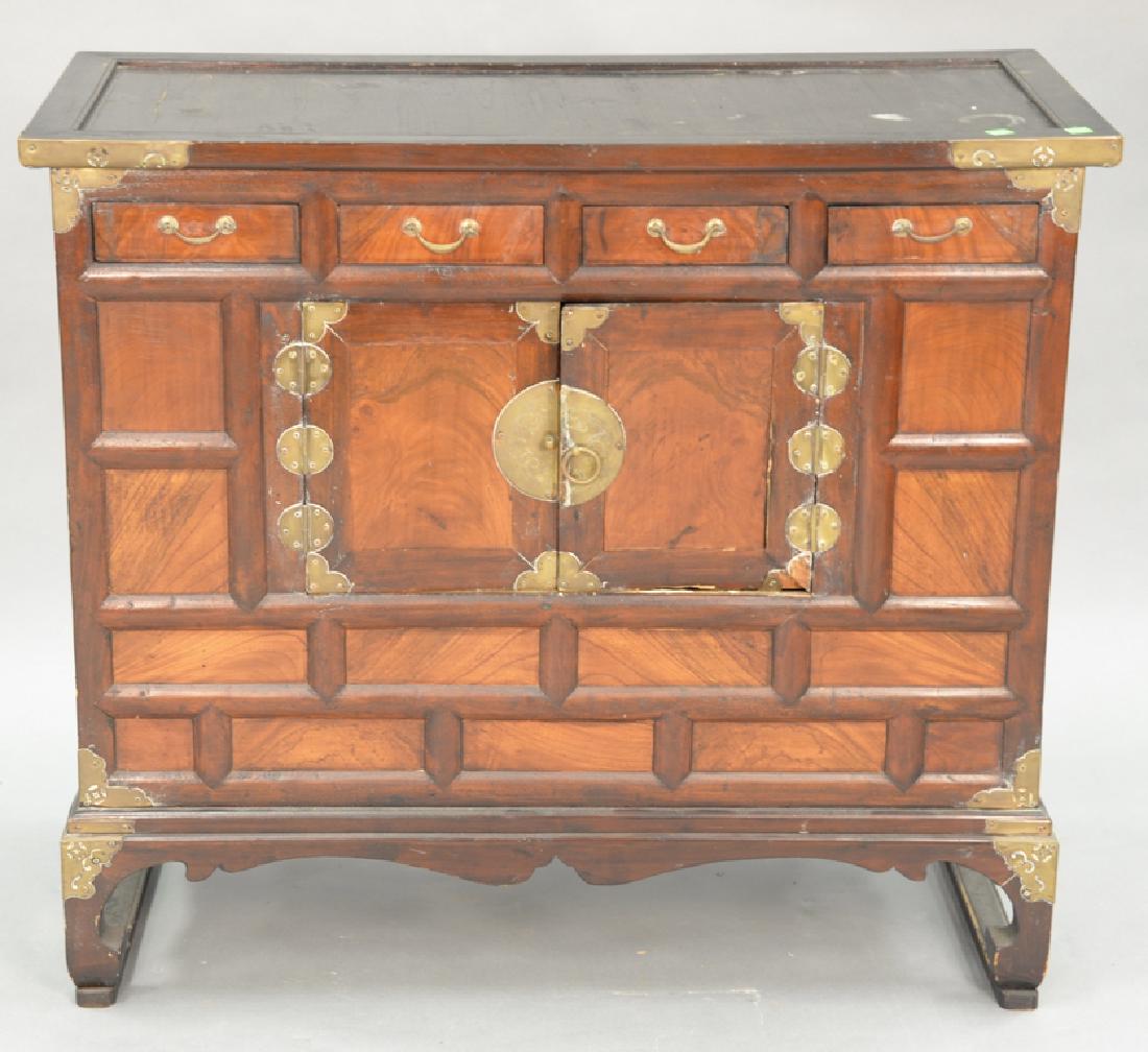 Korean brass mounted hardwood chest on frame, 19th: Korean brass mounted hardwood chest on frame, 19th century. ht. 33 1/2 in., lg. 38 in.