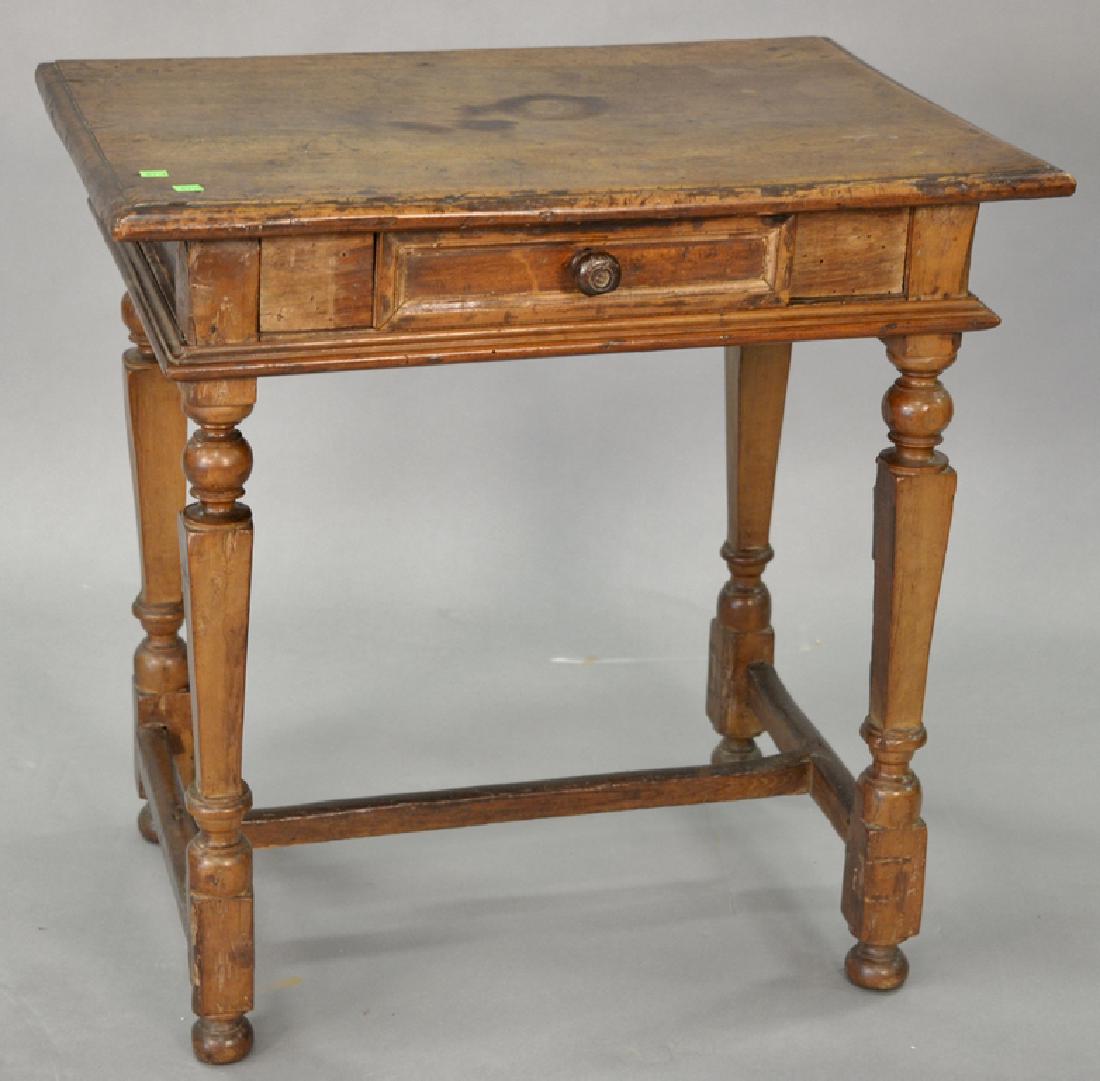 Continental baroque pine and walnut side table,: Continental baroque pine and walnut side table, rectangular top above a single frieze drawer and raised on square section and baluster turned legs joined by H stretcher, 18th century. ht. 29 in., lg.